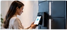 Employee using a smart locker in a modern workplace