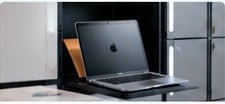 Laptop stored in a smart asset locker