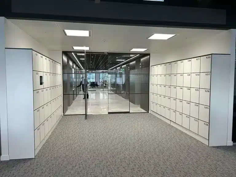 Vpod office locker installation photographed during site planning; survey work should confirm cabinet position, power and cable routes